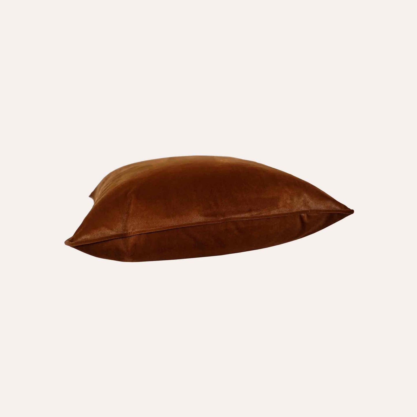 Soft raw umber velvet with stylish piping cushion cover.