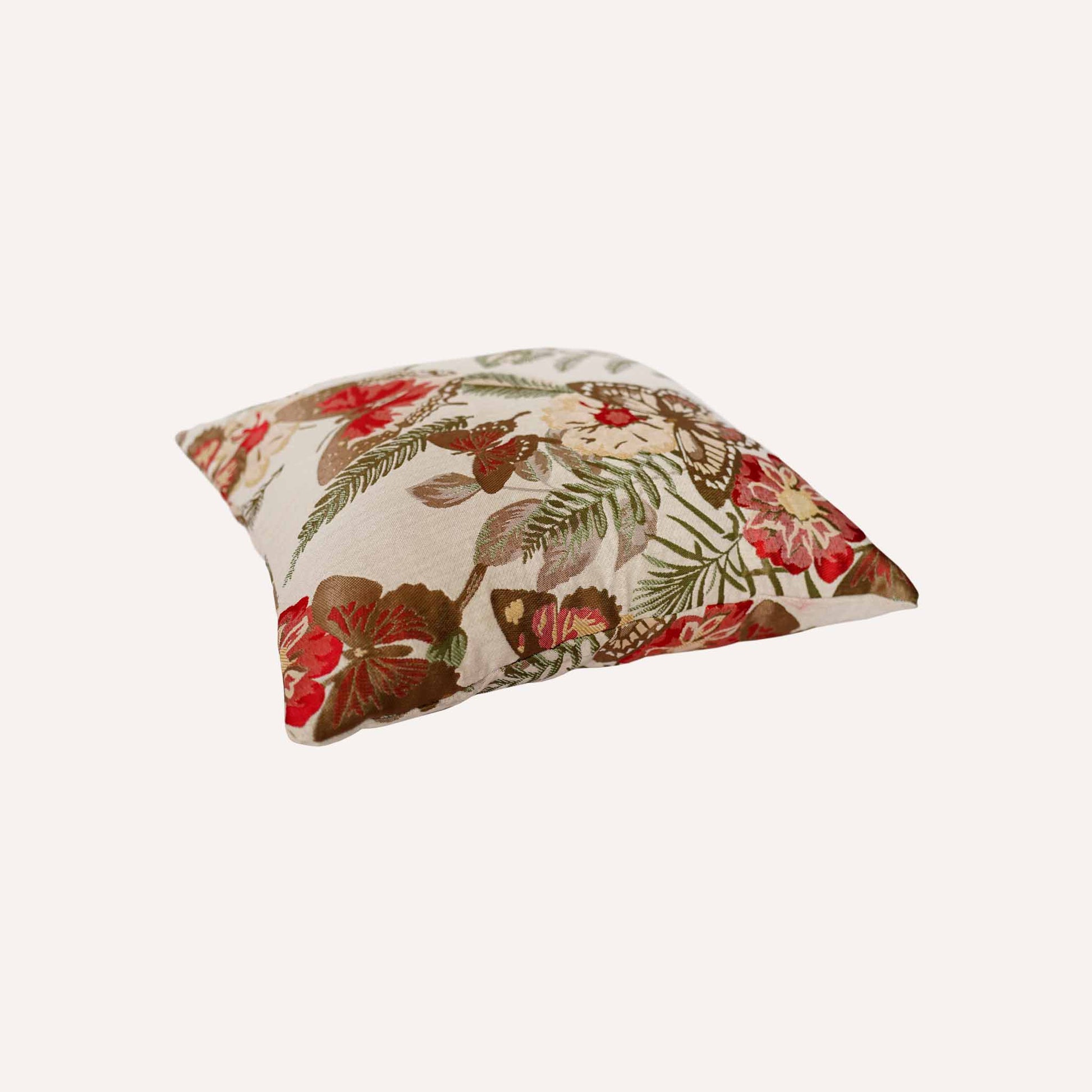 Red butterfly and floral pattern cushion.