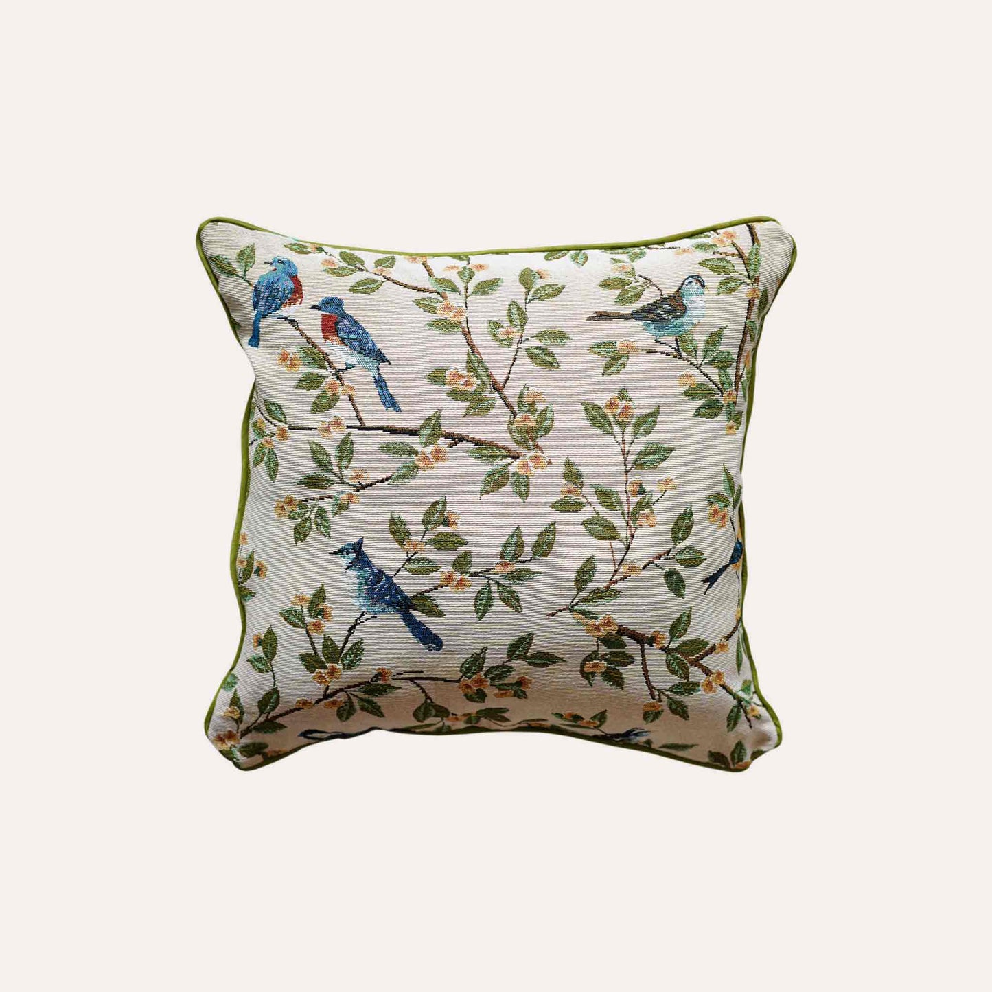 A stylish cushion cover adorned with retro birds on branches.