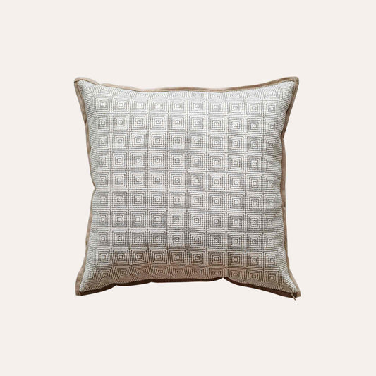 Retro luxury cushion covers with beige-brown geometric design on a neutral background.