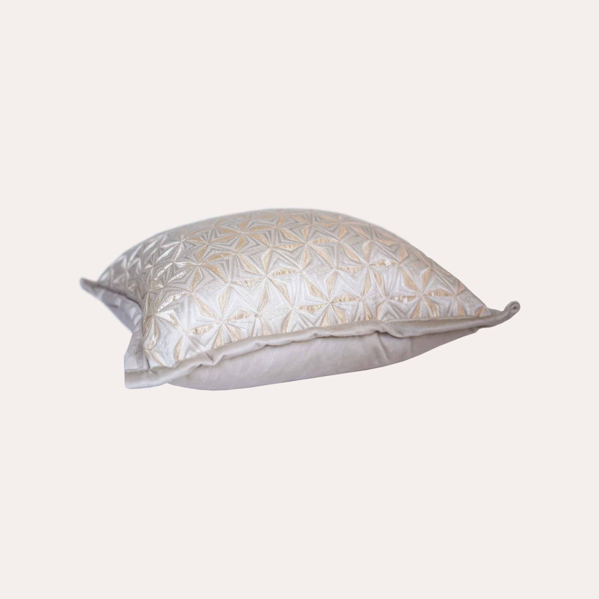 Elegant jacquard cushion covers with windmill motif and subtle 3D effect.