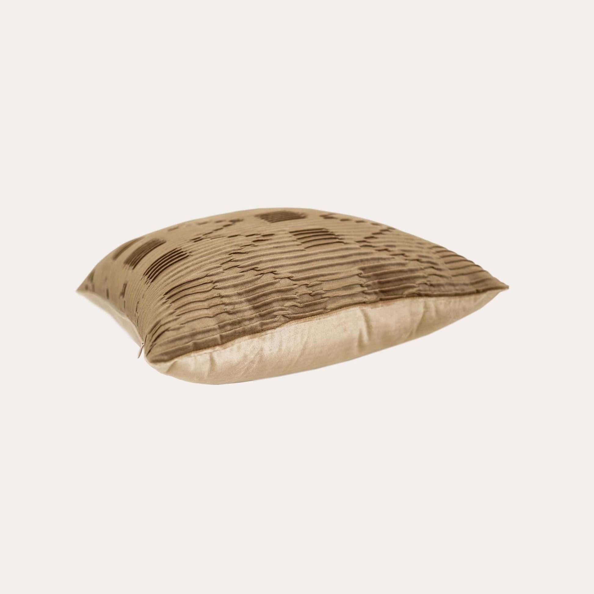 Brown pleated embossed velvet cushion covers.