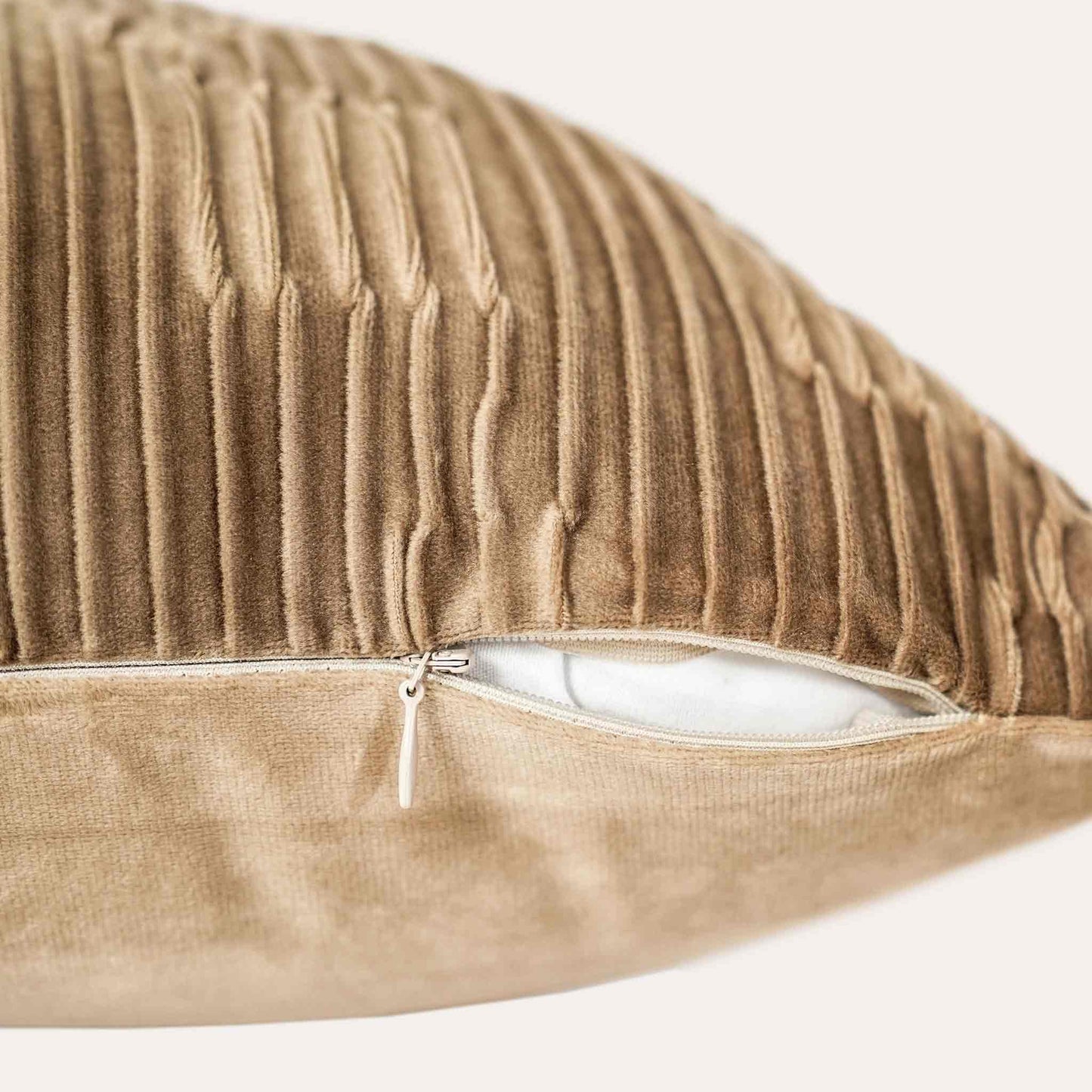 Brown pleated embossed velvet cushion covers with invisible zipper.