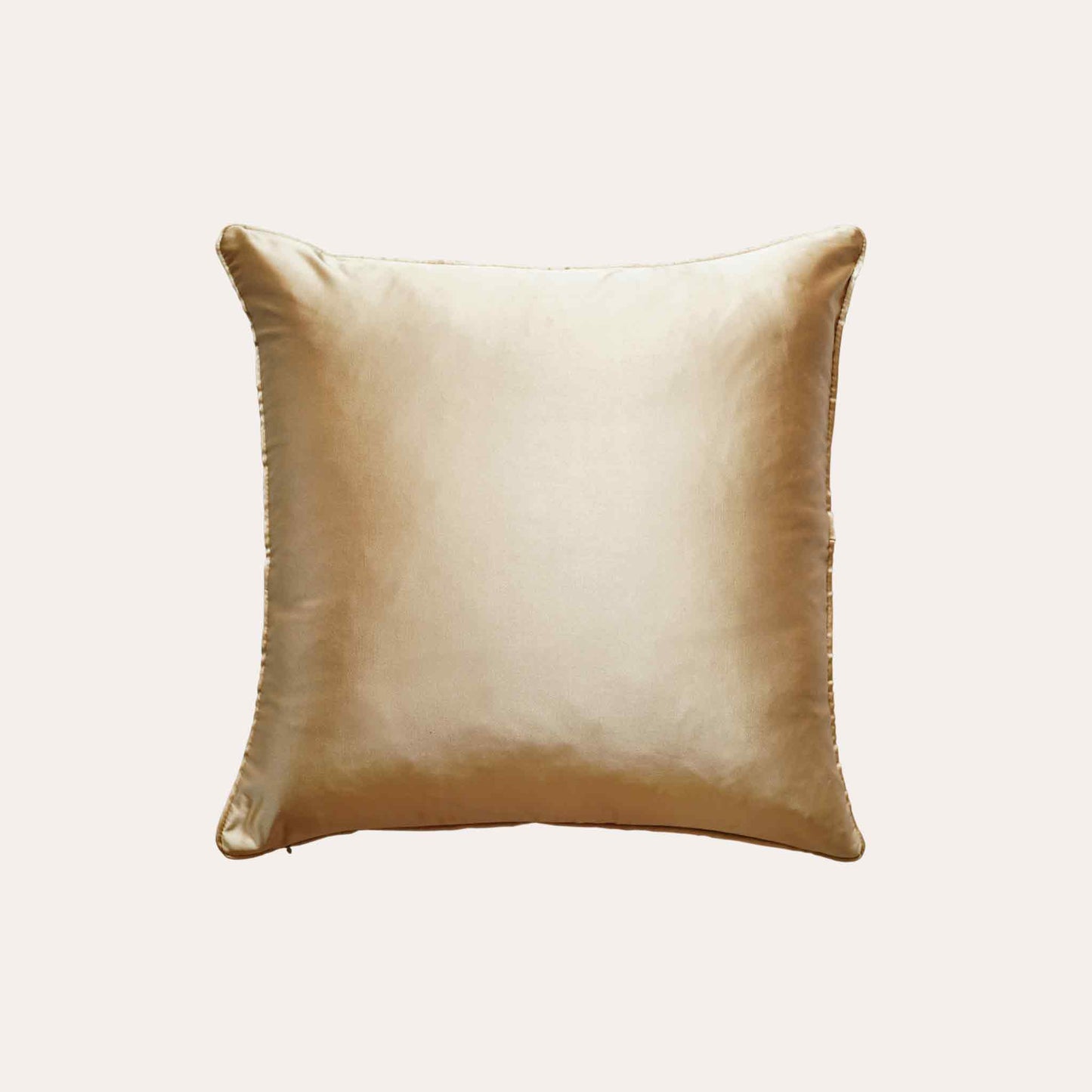 Elegant champagne gold color cushion cover showcasing a unique geometric pattern with solid gold back.