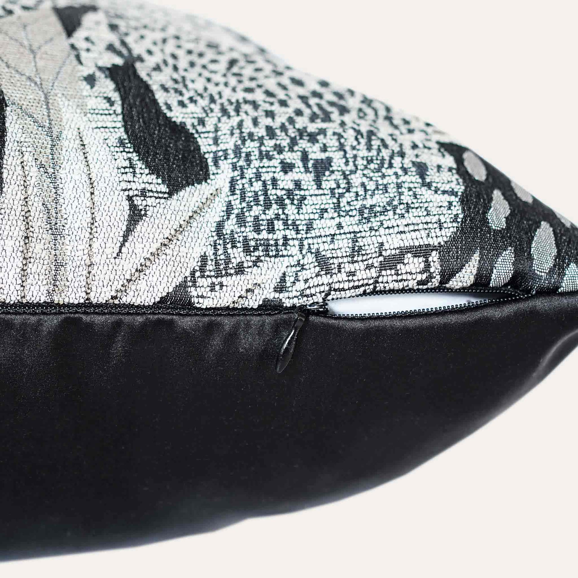 Black and gold jungle animal cushion cover with invisible zipper.