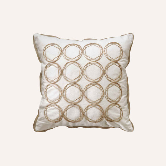 Round twine design cushion with white background adds a modern touch to home decor.