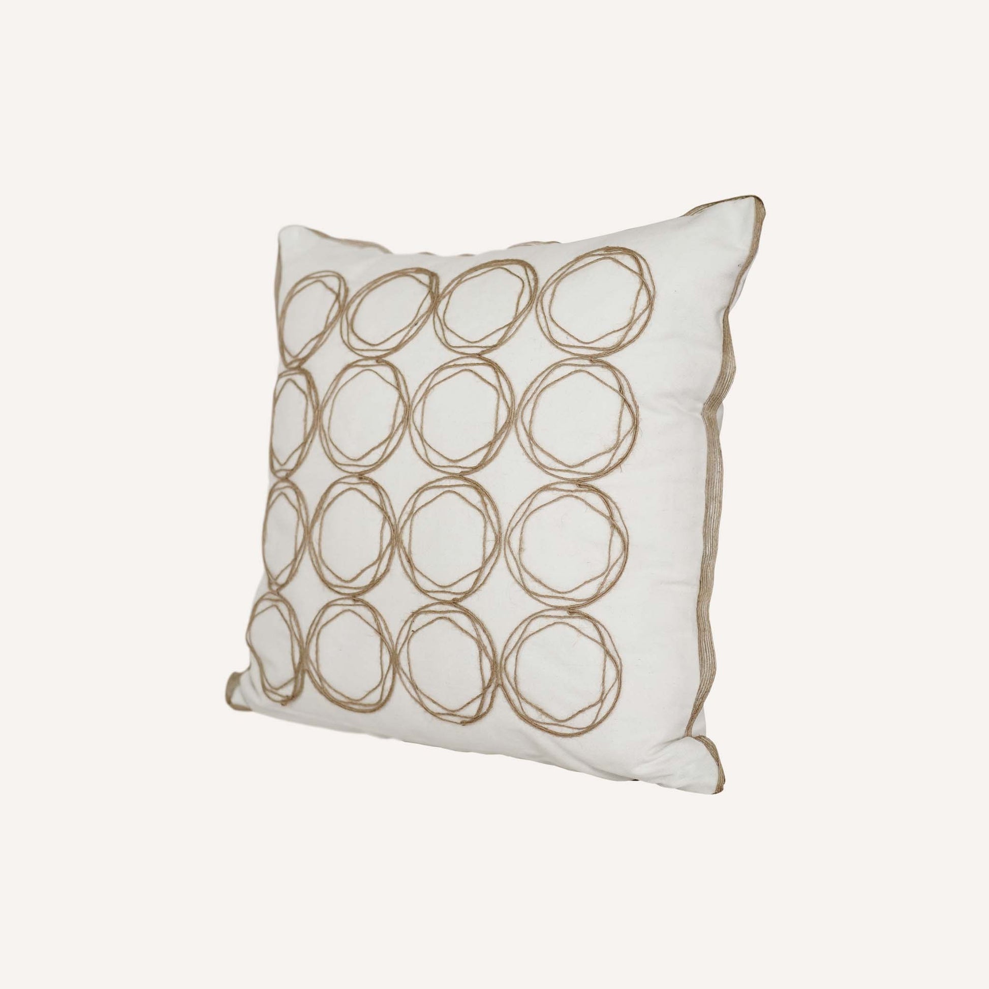 Round twine design cushion with white background adds a modern touch to home decor.