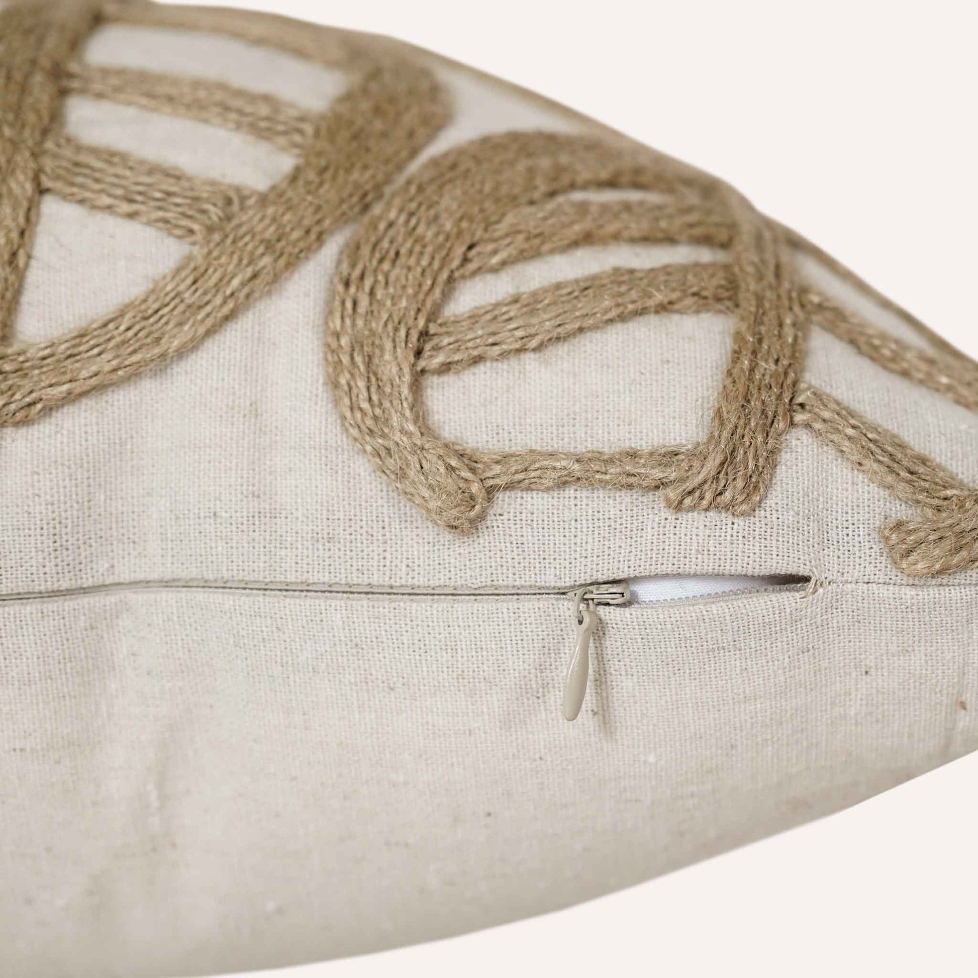 Close-up of the invisible zip on the twine leaf cushion.