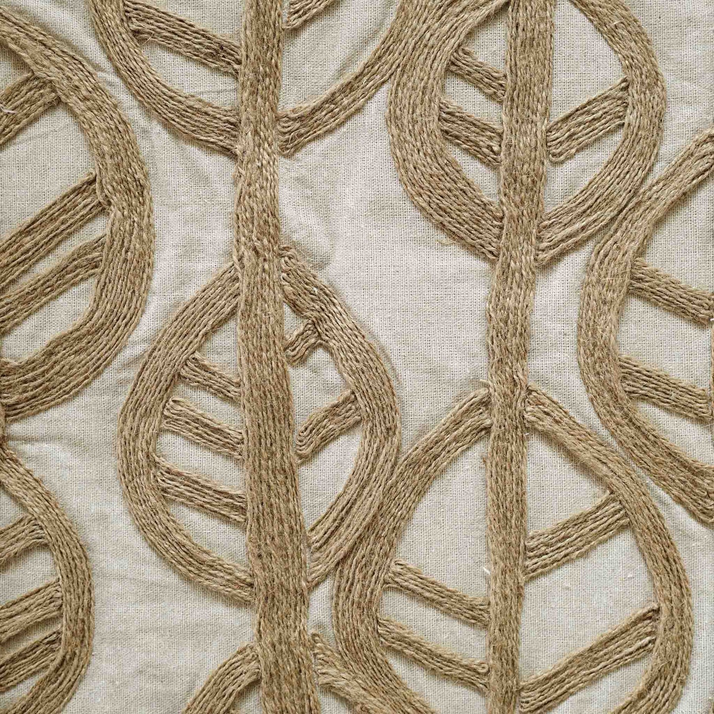 The cushion features a decorative twine leaf design that combines natural beauty with comfort.