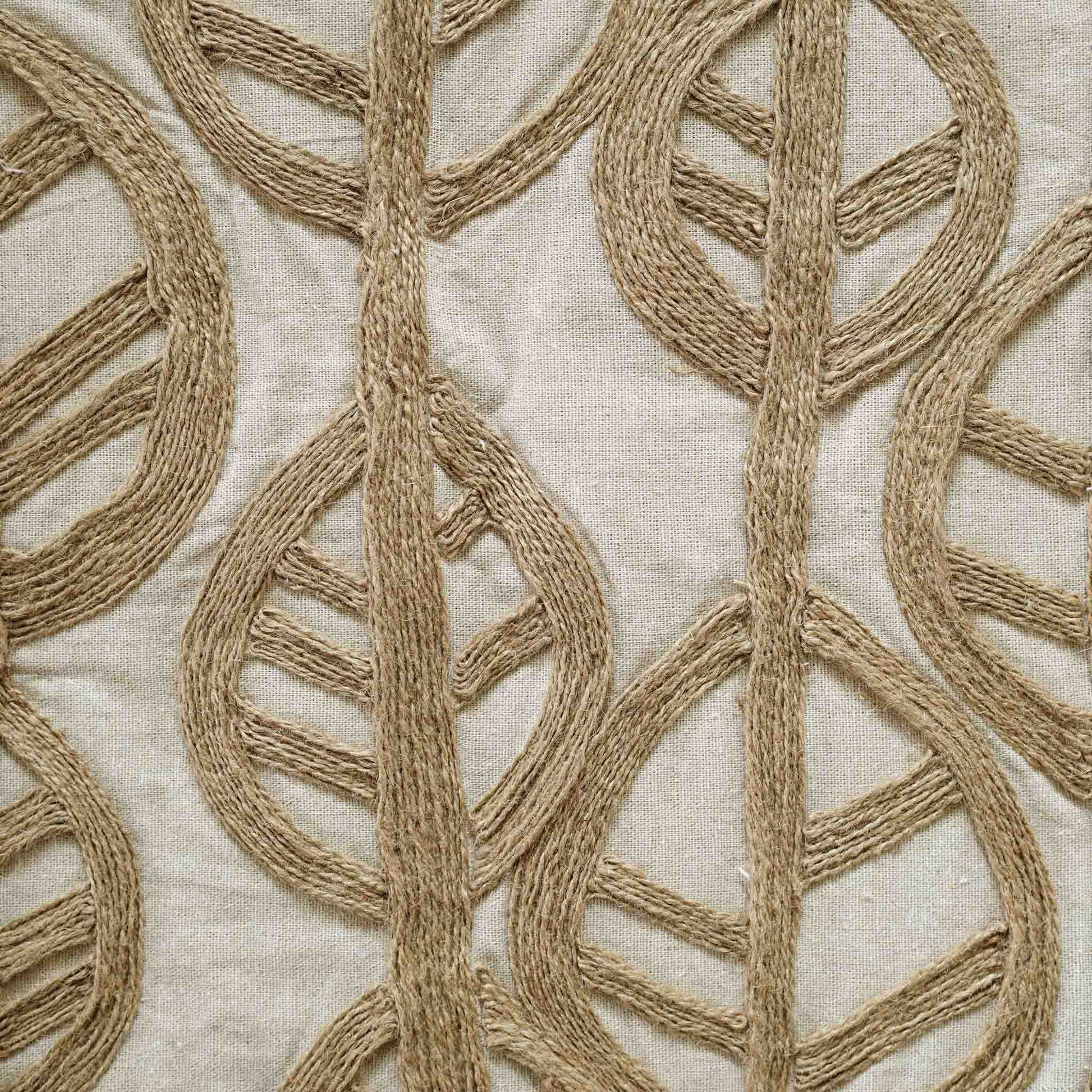 The cushion features a decorative twine leaf design that combines natural beauty with comfort.