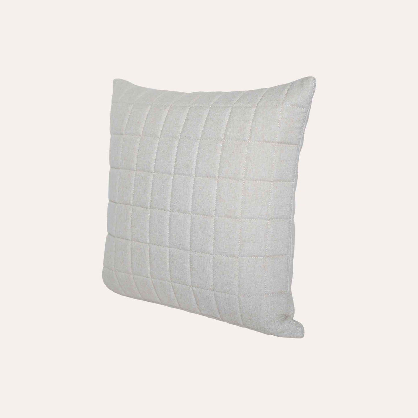 Soft beige quilted showcasing a geometric design cotton cushion cover.