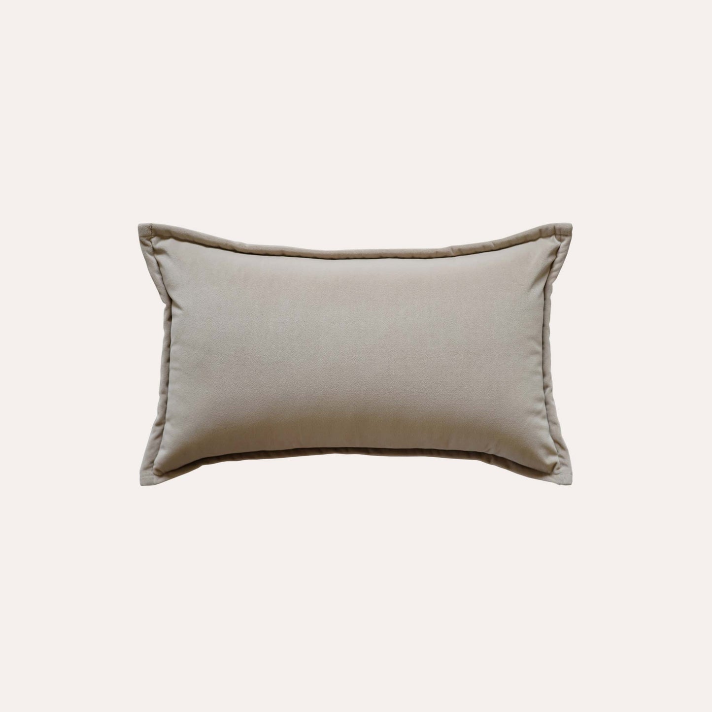 Grey woven textured wool lumbar cushion cover with beige back.