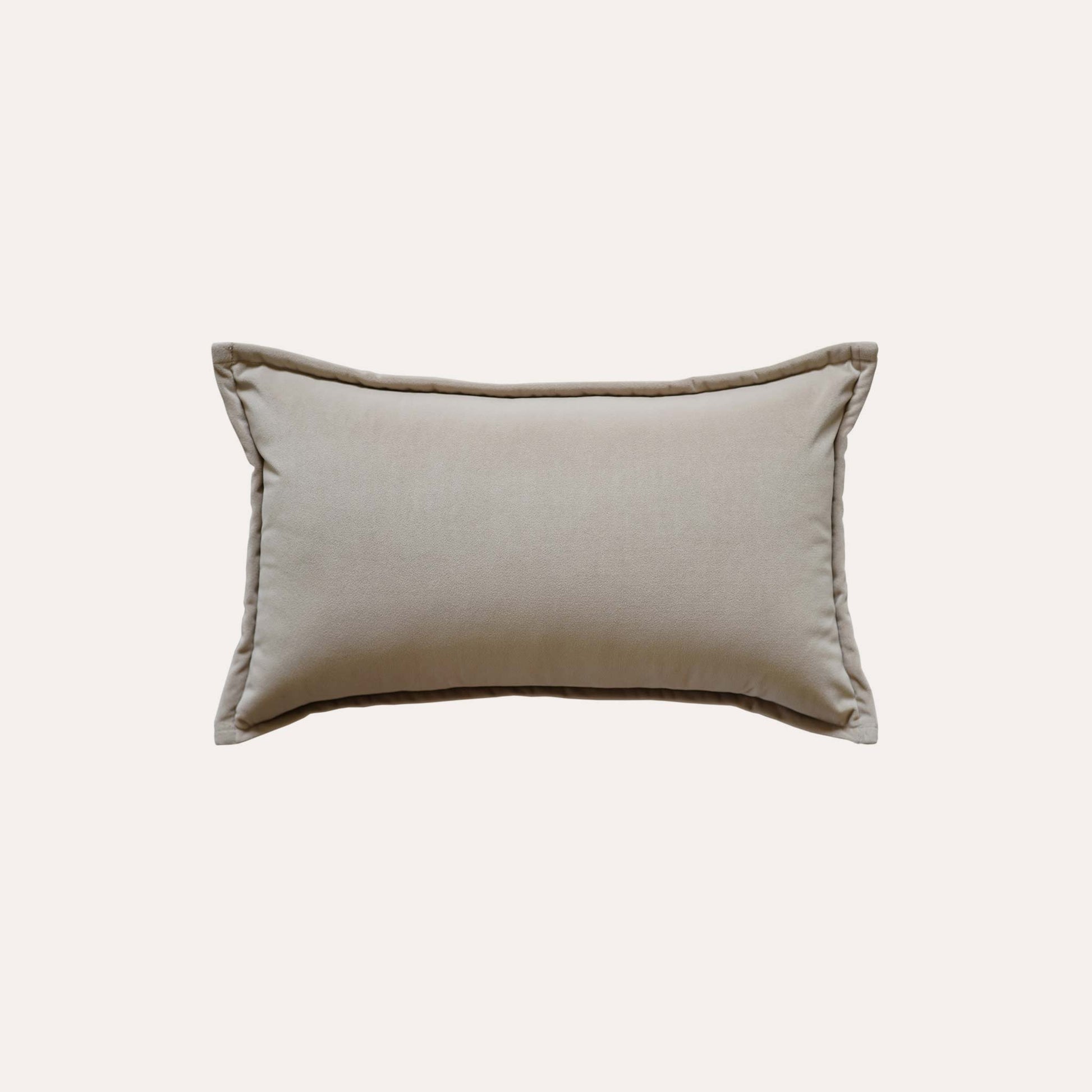 Grey woven textured wool lumbar cushion cover with beige back.