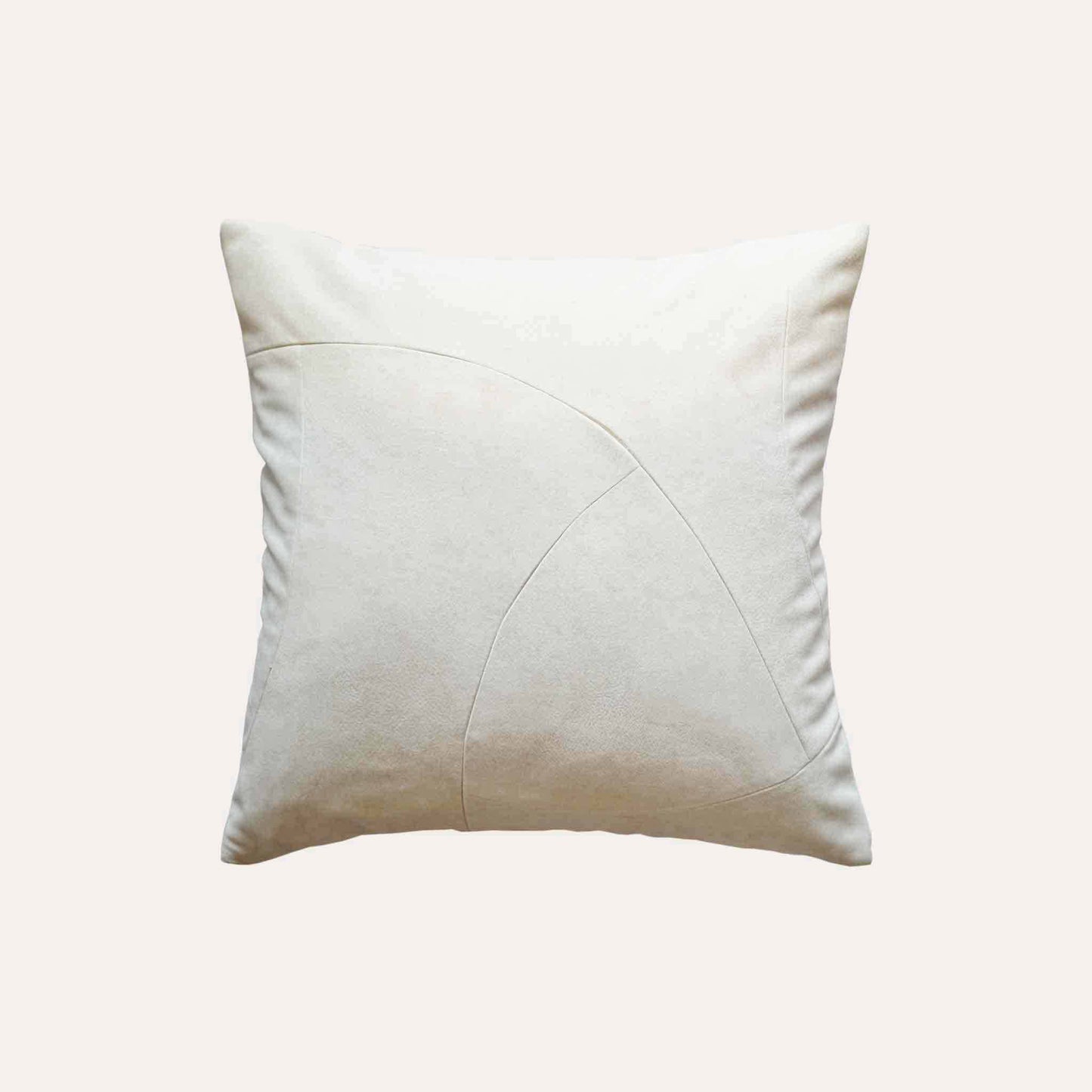 Chic white curved patchwork cushion cover.