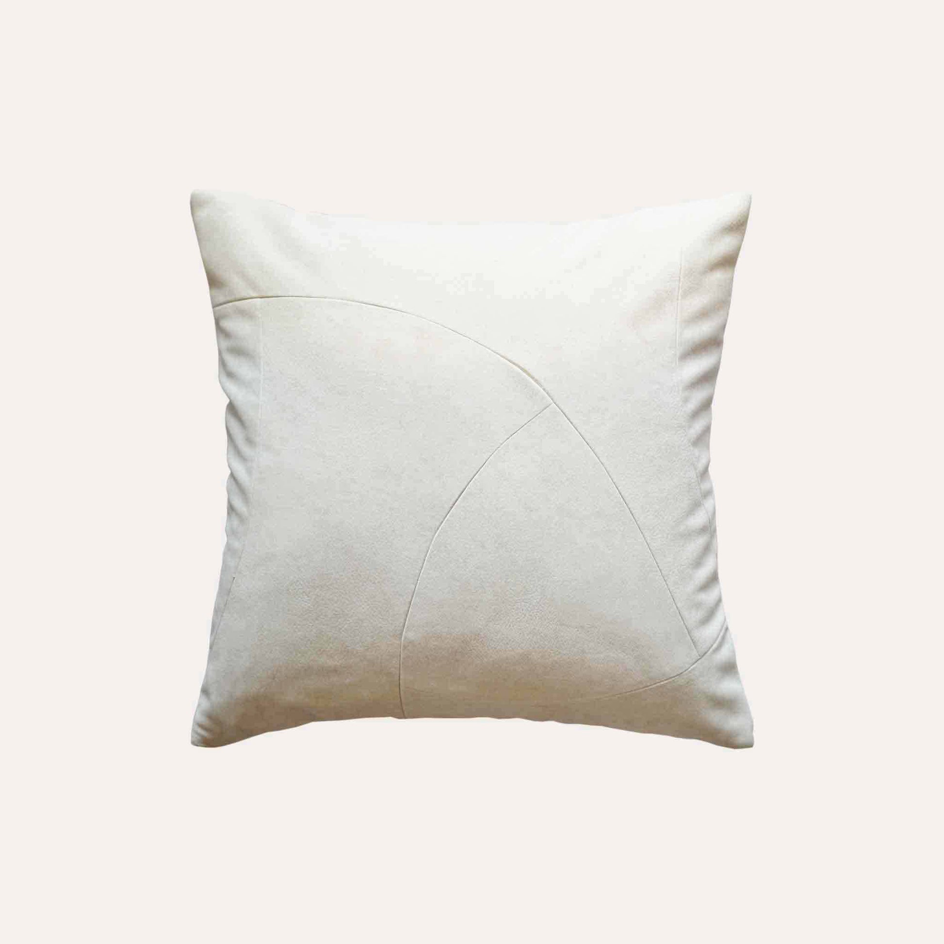 Chic white curved patchwork cushion cover.