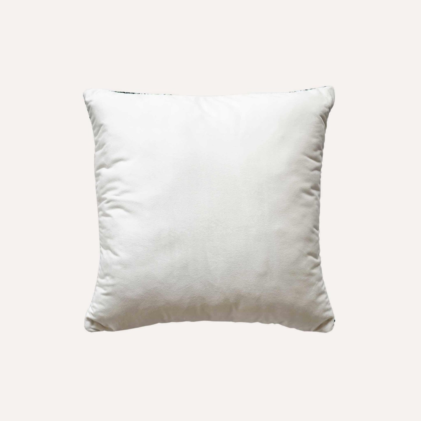 Black and white crayon strokes wool cushion with white back.