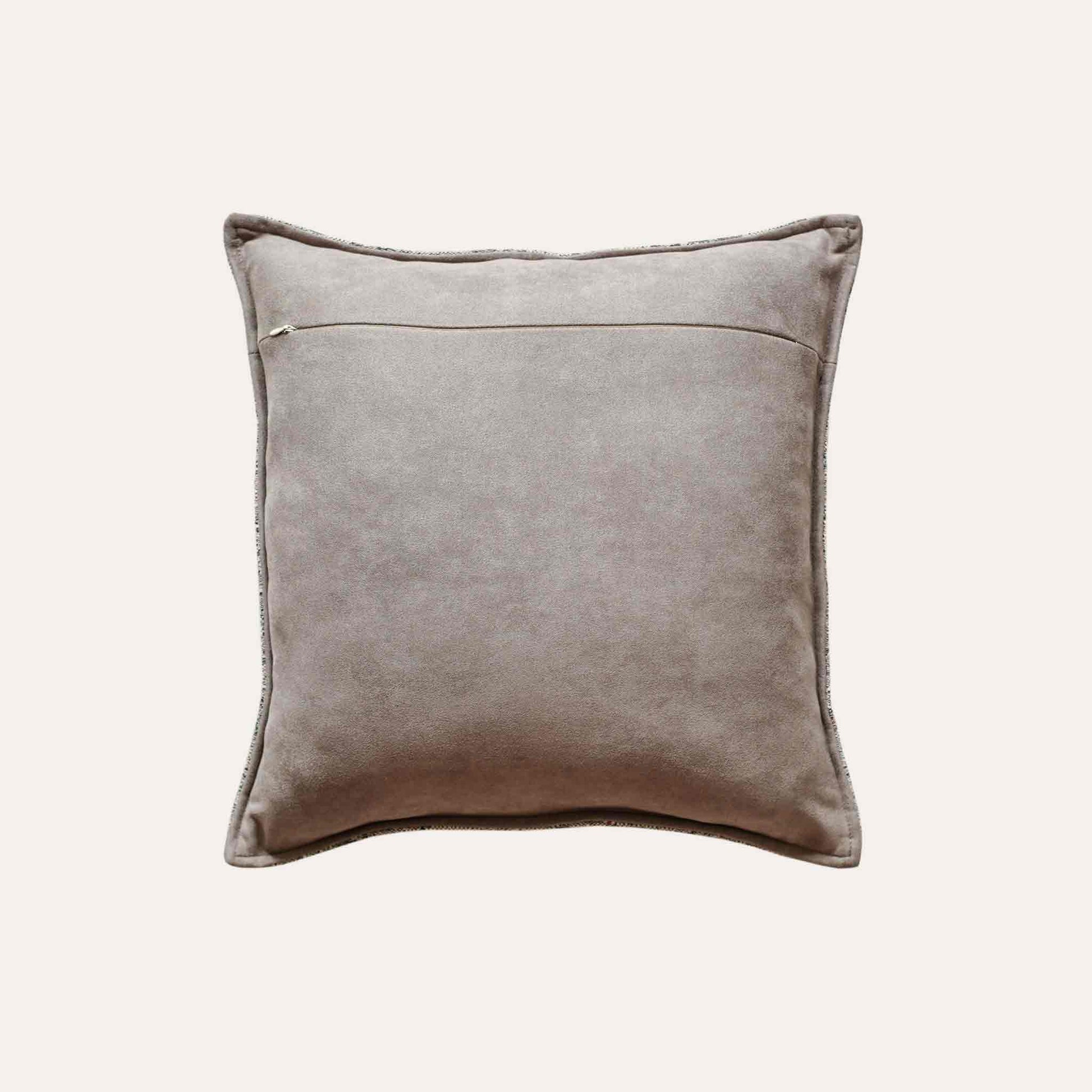 Gray and white mixed color woven texture cushion cover with beige back.