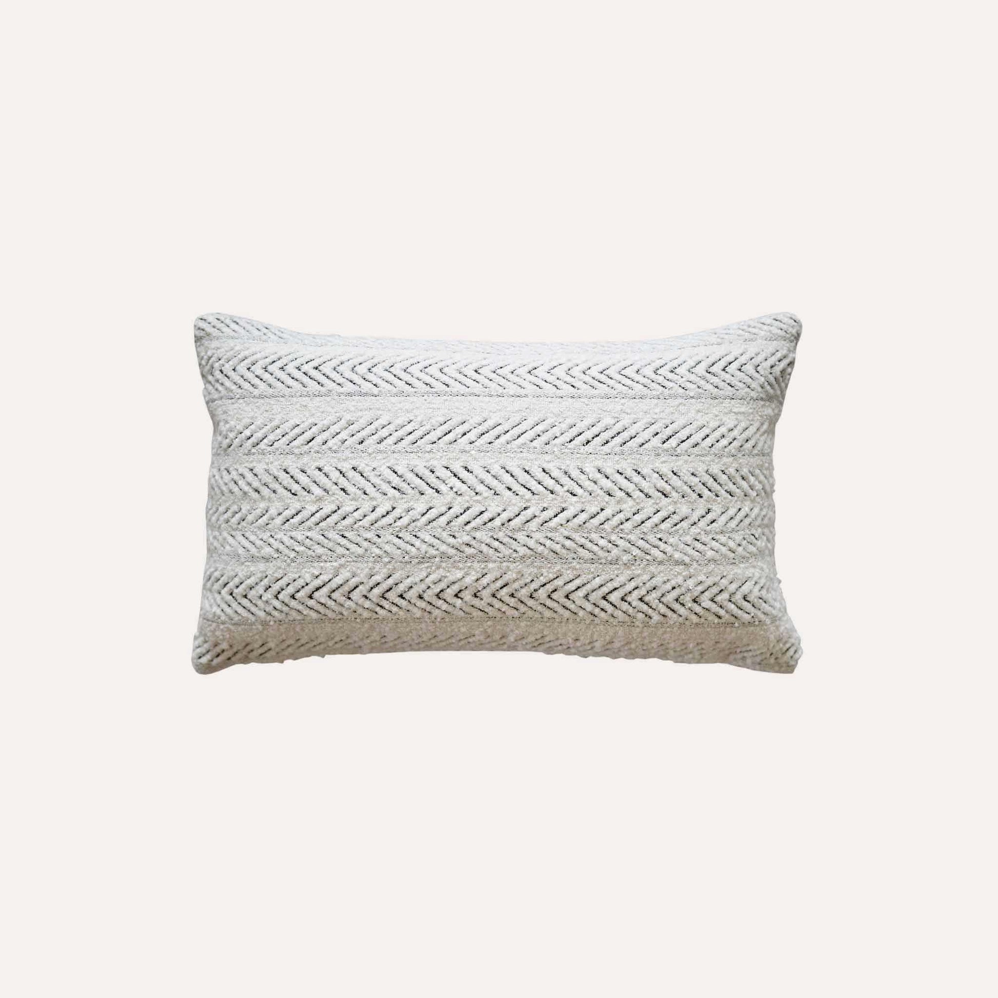 White textured herringbone pattern cushion cover.