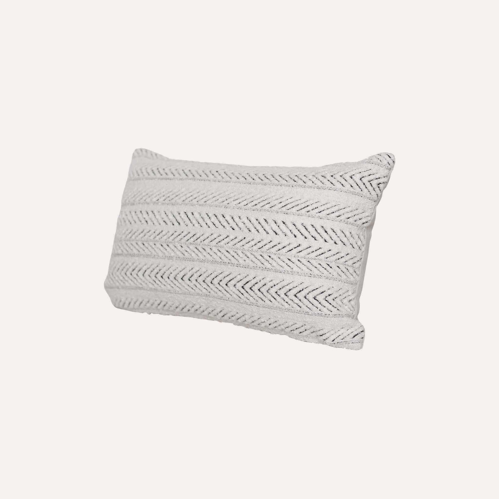 White textured herringbone pattern cushion cover.