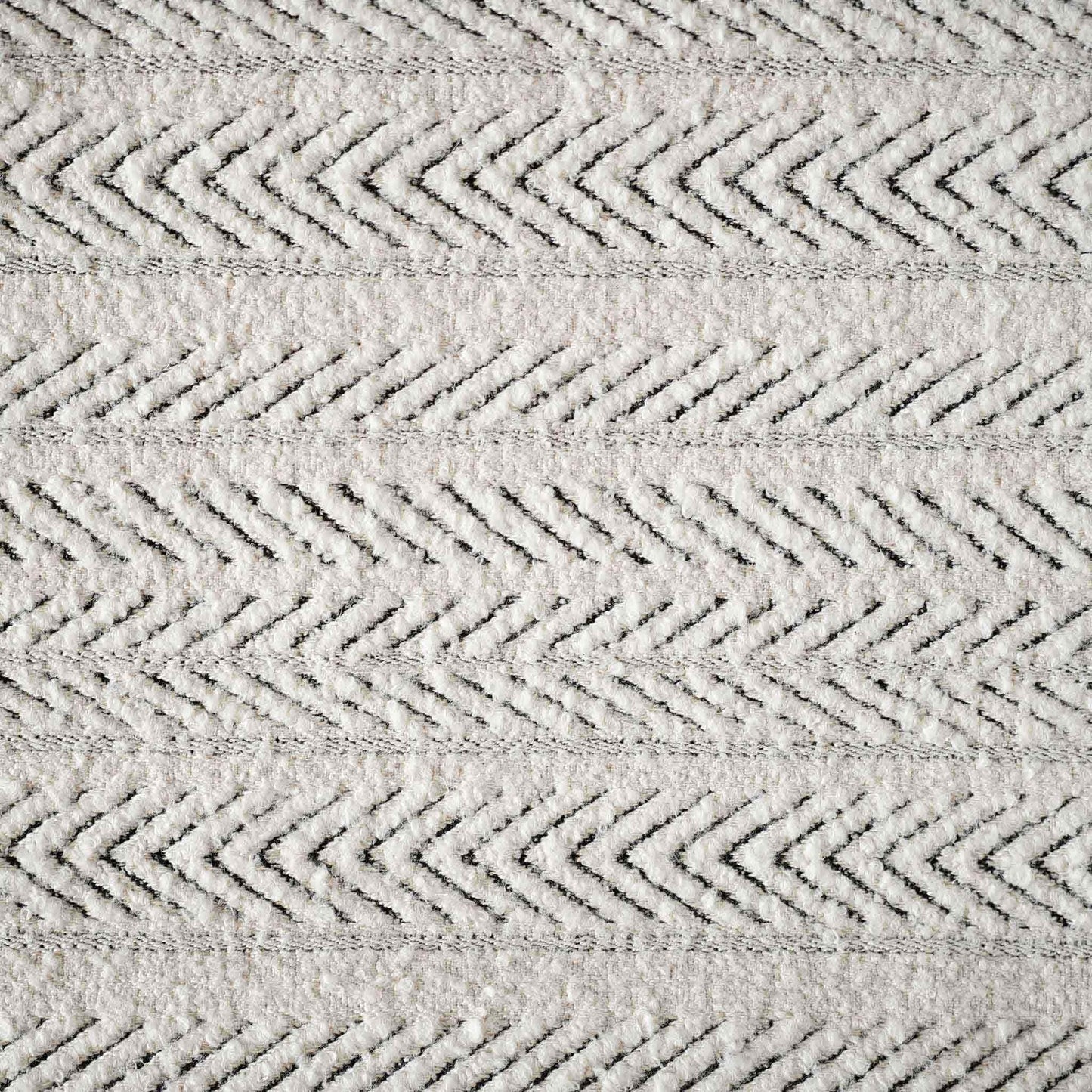 White textured herringbone pattern cushion cover.