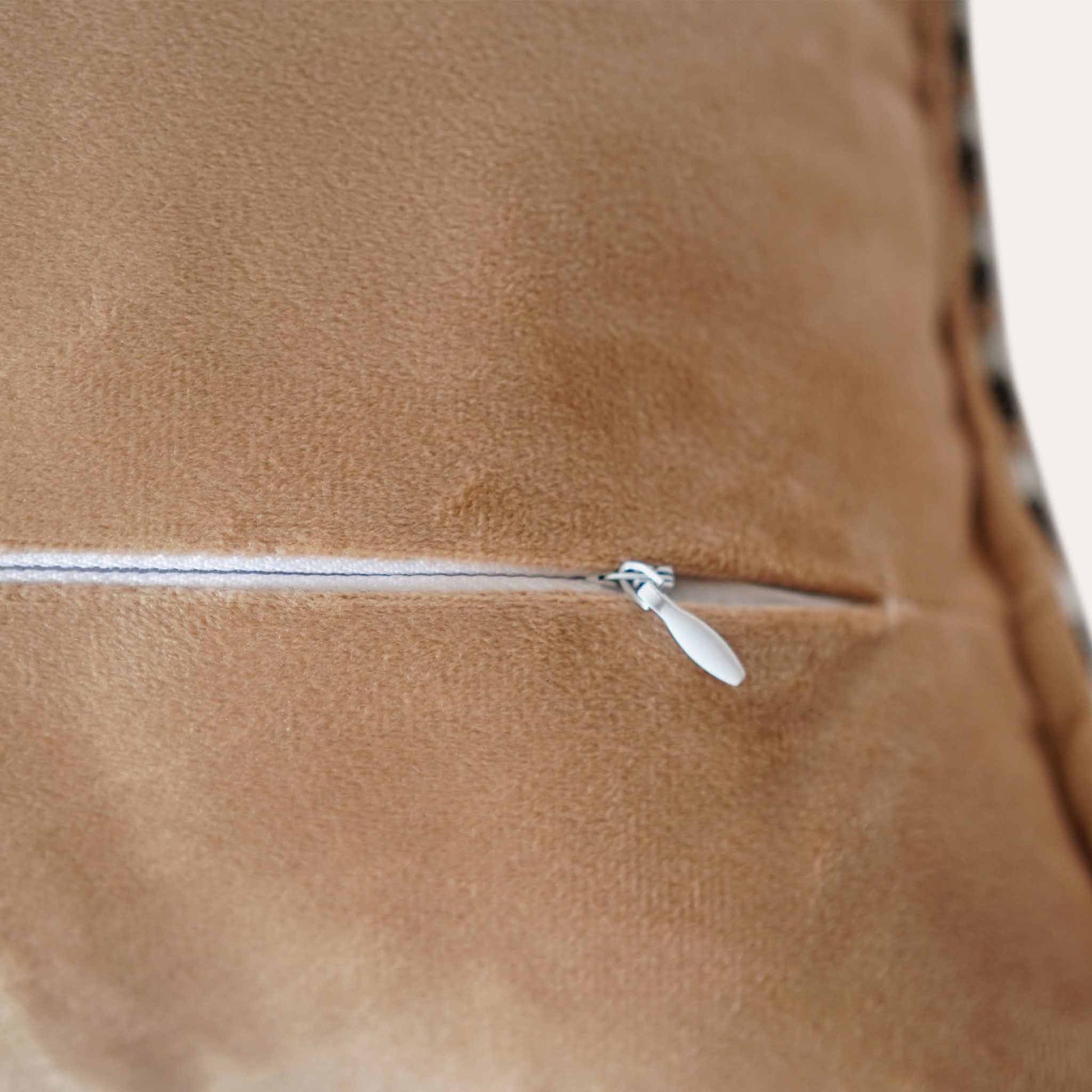 A yellow-black woven textured cushion cover with invisible zipper.