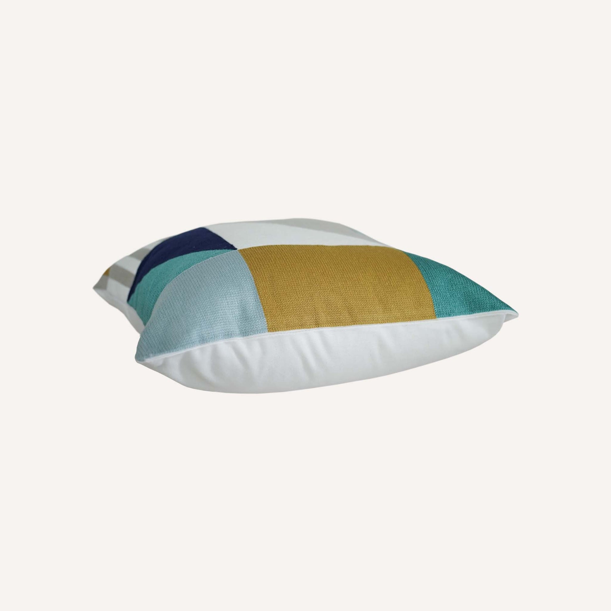 Yellow green grey irregular geometric pattern embroidered cotton cushion.